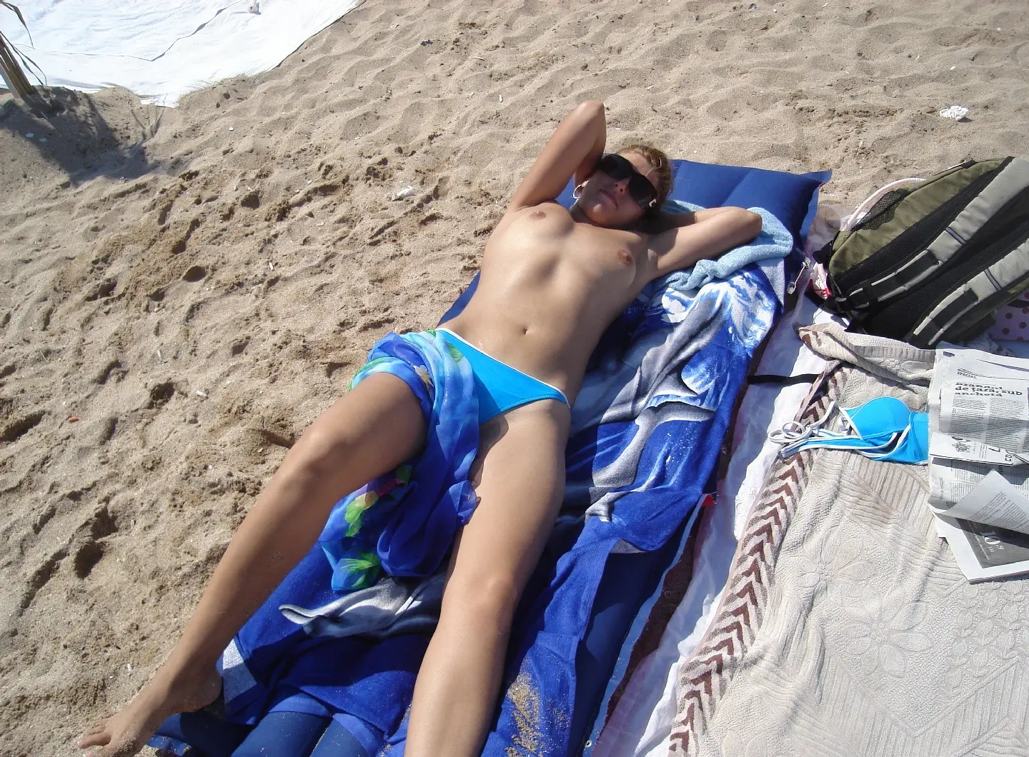 Topless Beach Sunbathing Amateur Photo - Explicit and Bold
