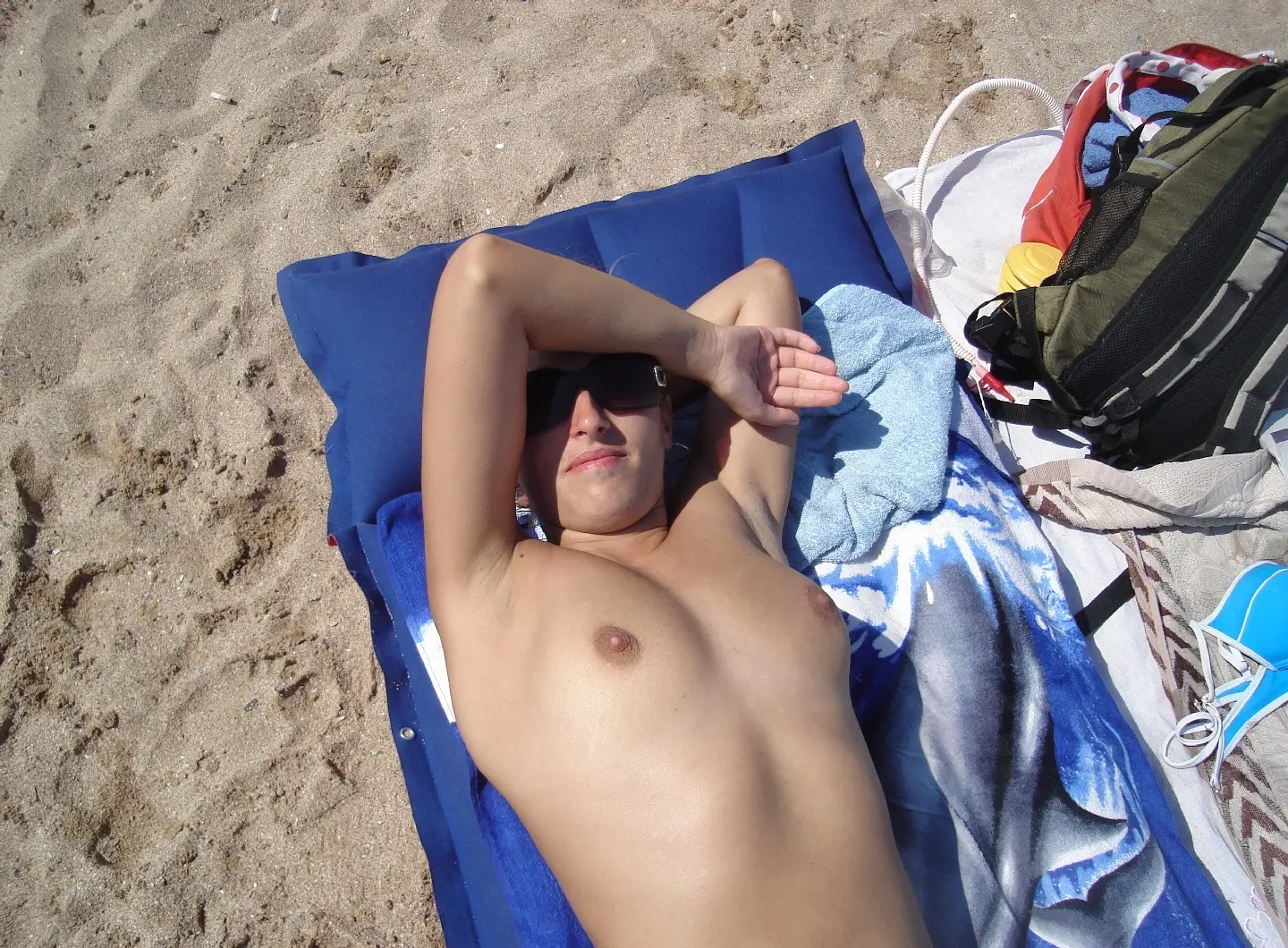 Topless Beach Sunbathing Amateur Photo - Explicit and Bold