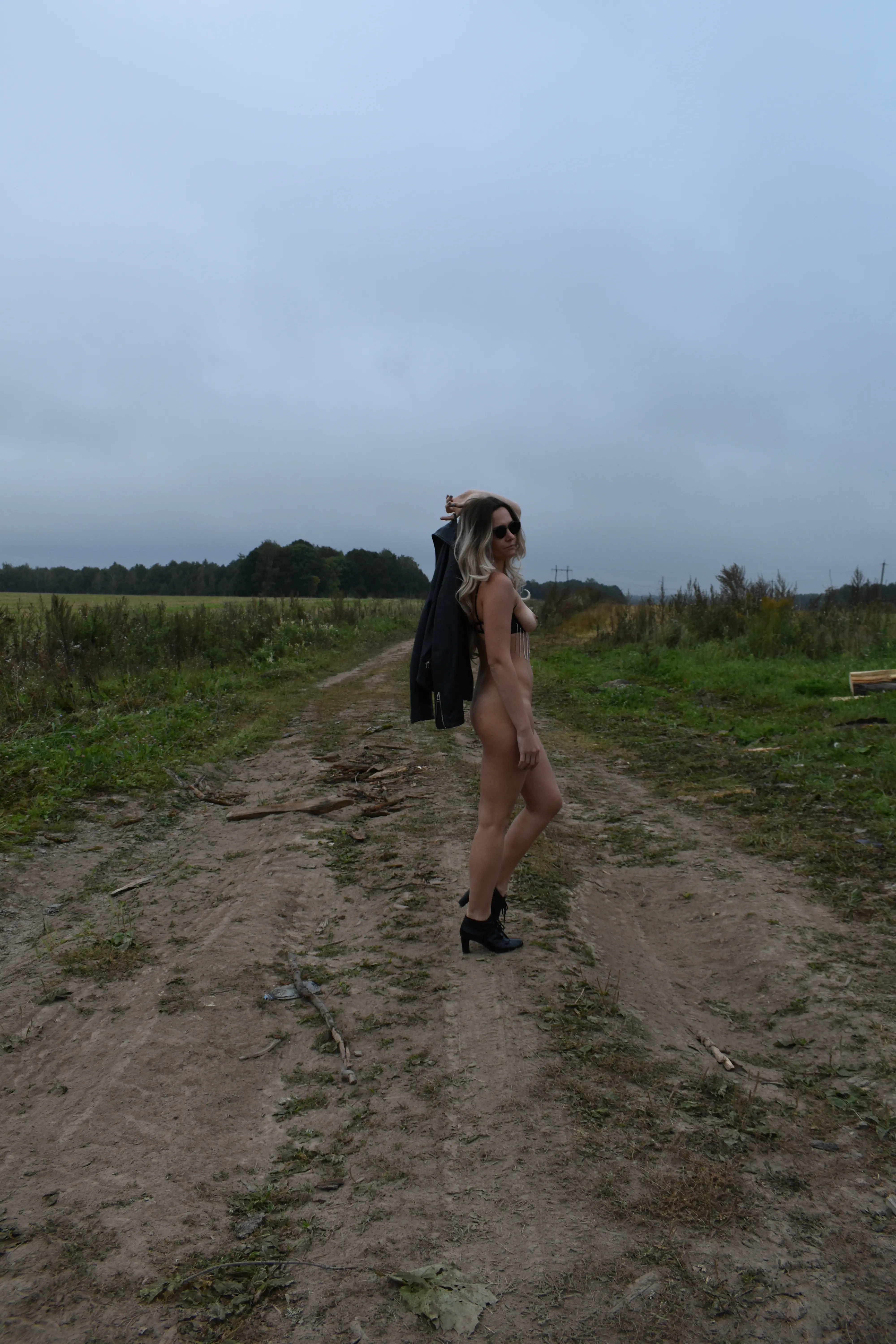 Sexy Girl Straddling Log: Explicit Amateur Photo
