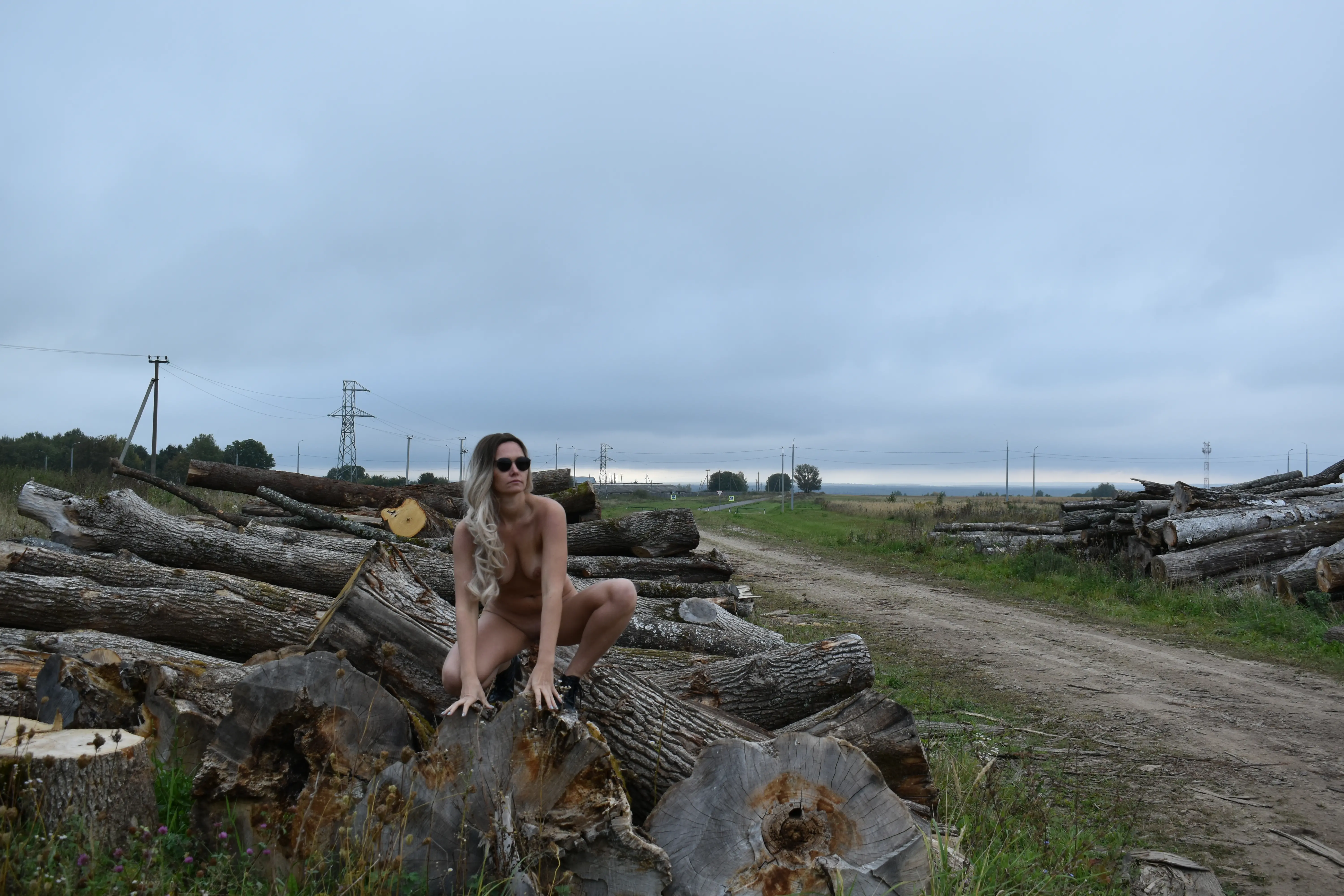 Sexy Girl Straddling Log: Explicit Amateur Photo