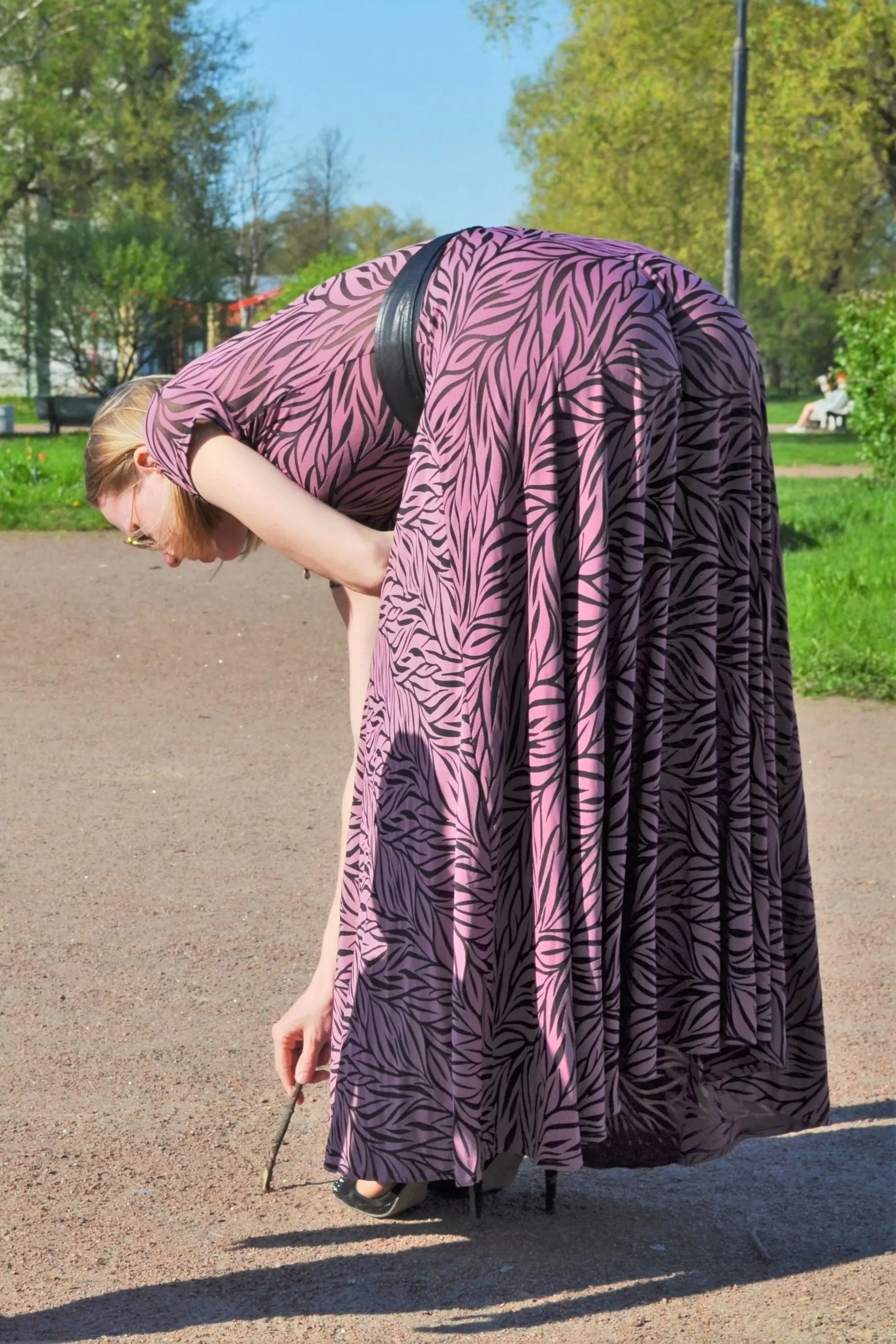 Seductive Long-legged Girl Poses Erotically, Showing Off Her Assets