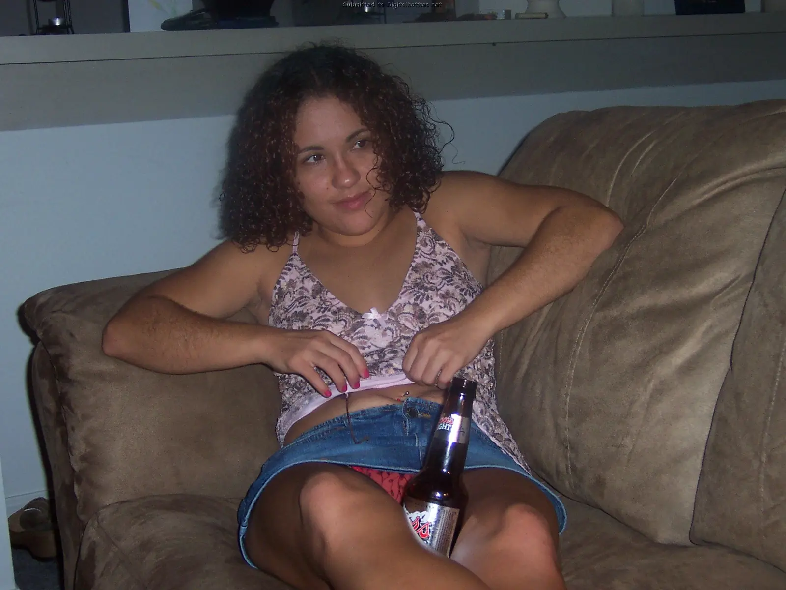 Curvy amateur sucks boyfriend's cock in explicit blowjob photo