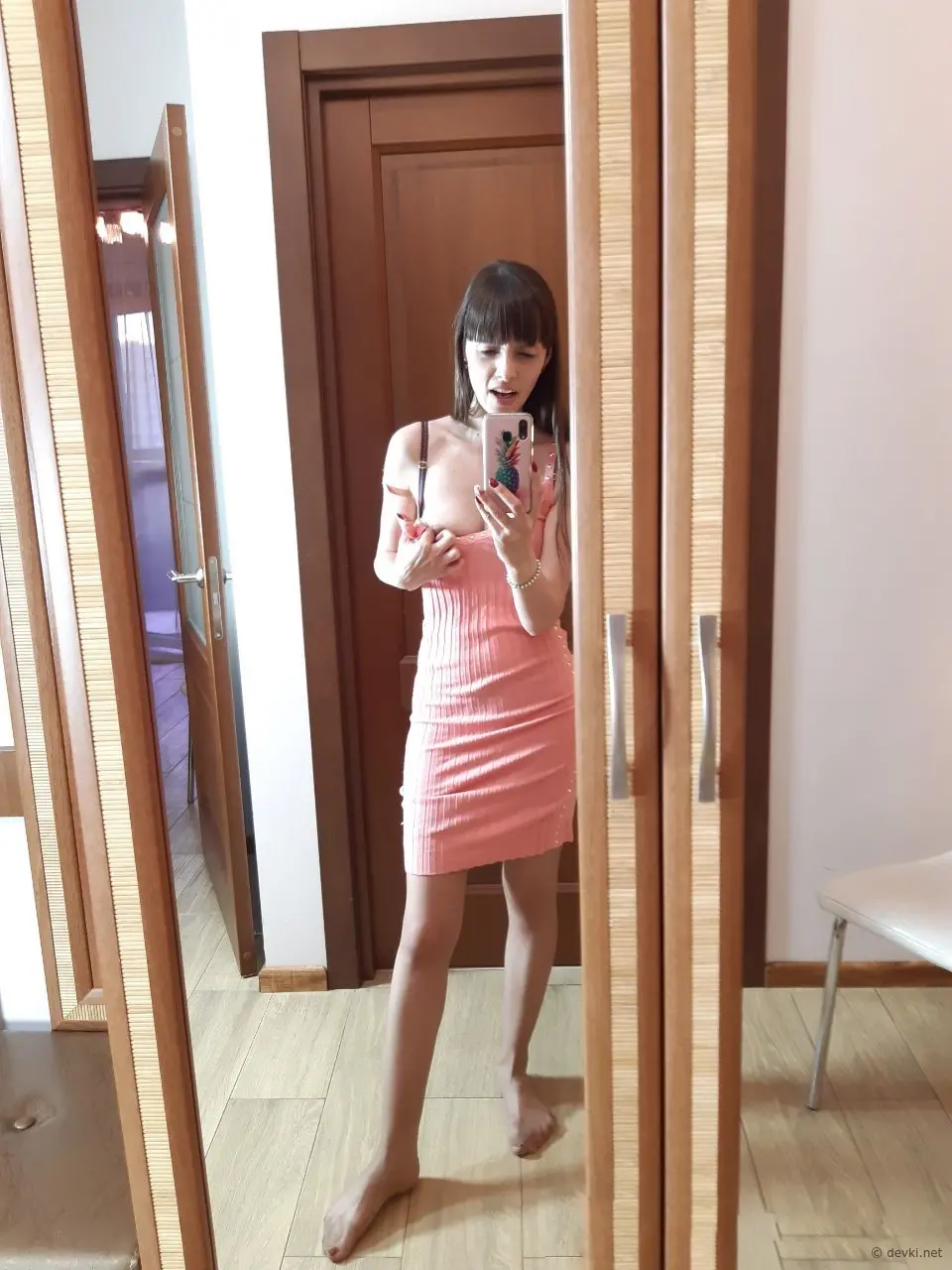 Seductive Brunette Poses in Stunning Stockings for Explicit Photoshoot