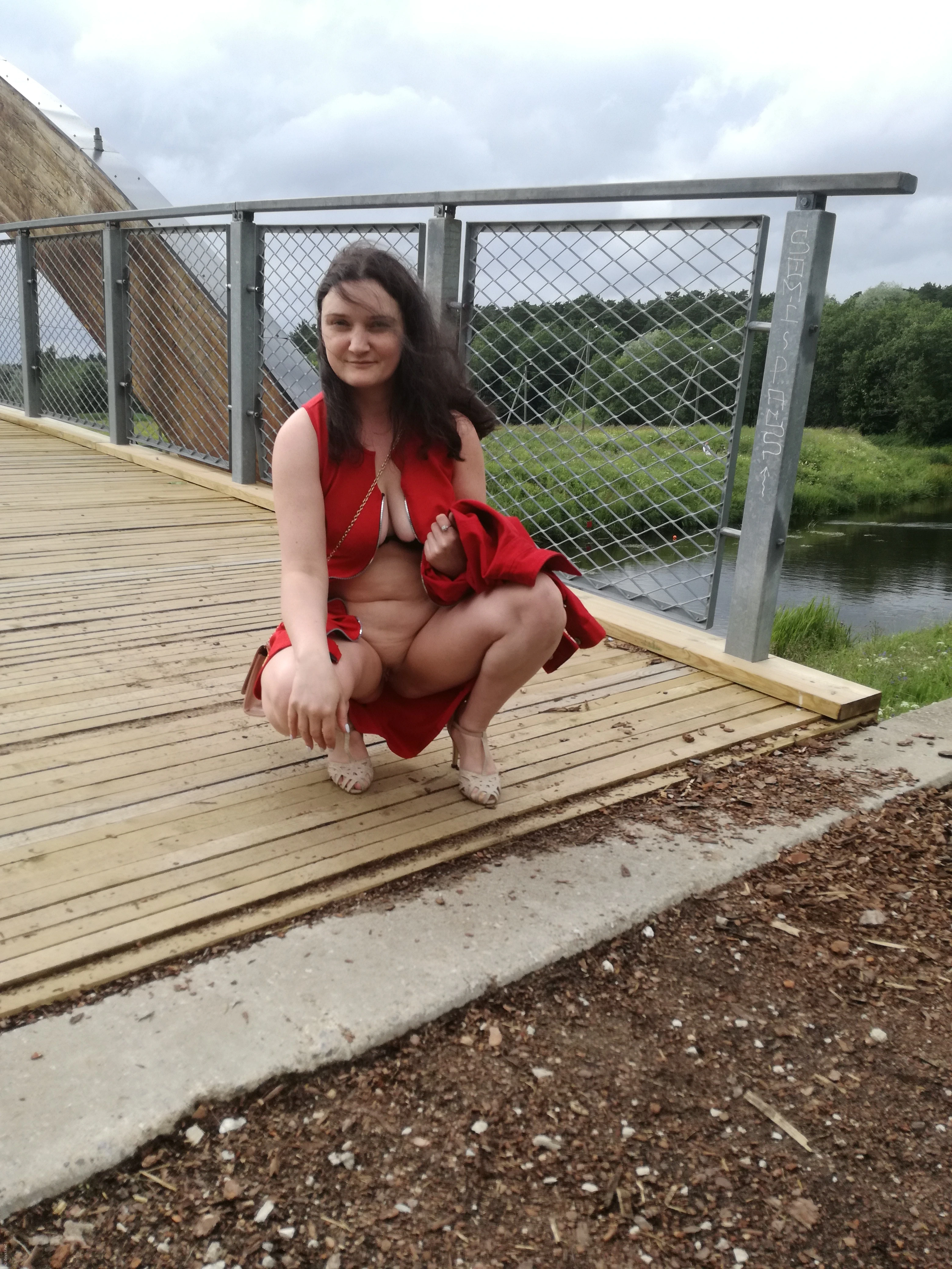 Woman Gives Blowjob in Car: Amateur Porn Photo