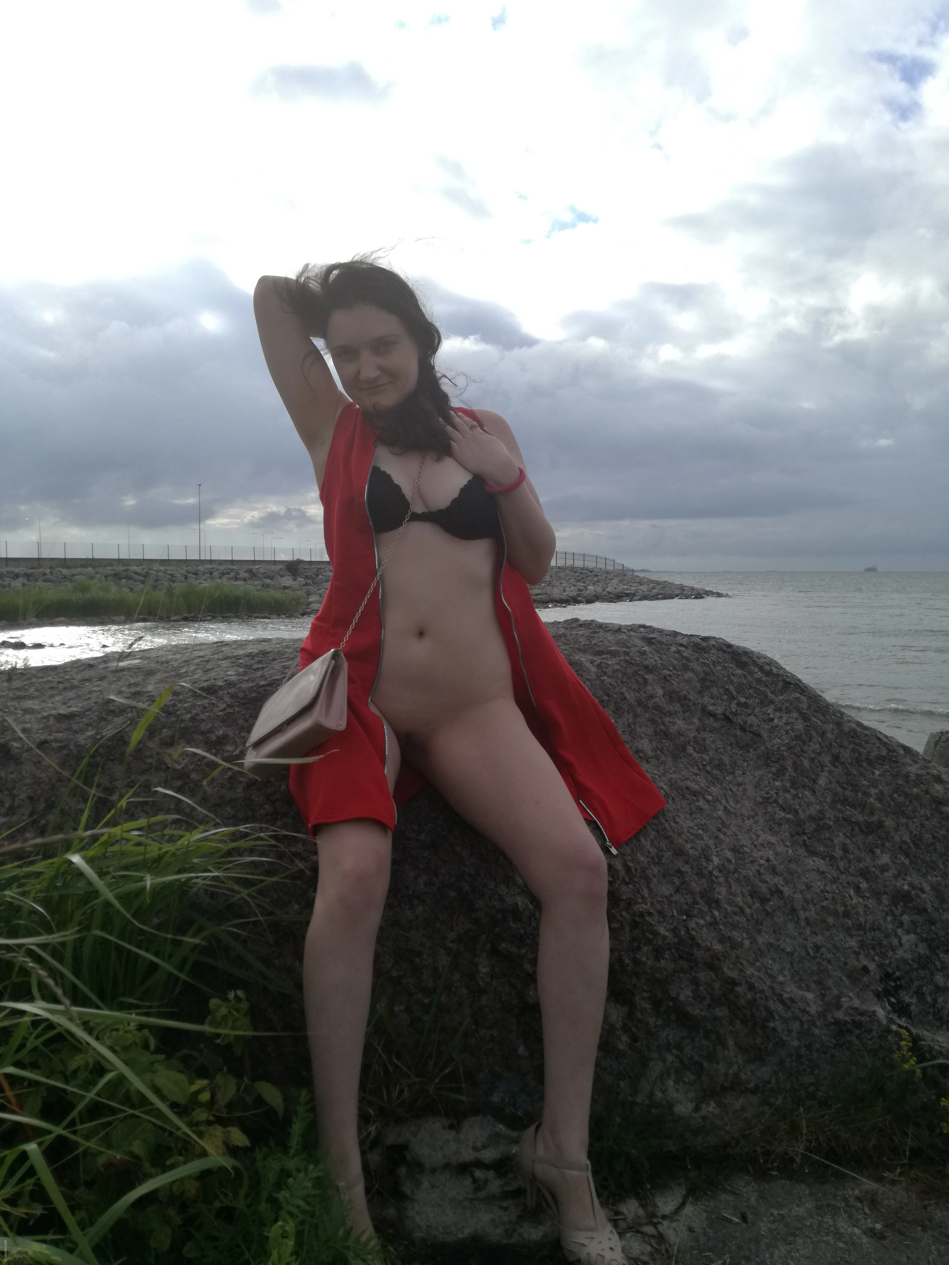 Woman Gives Blowjob in Car: Amateur Porn Photo