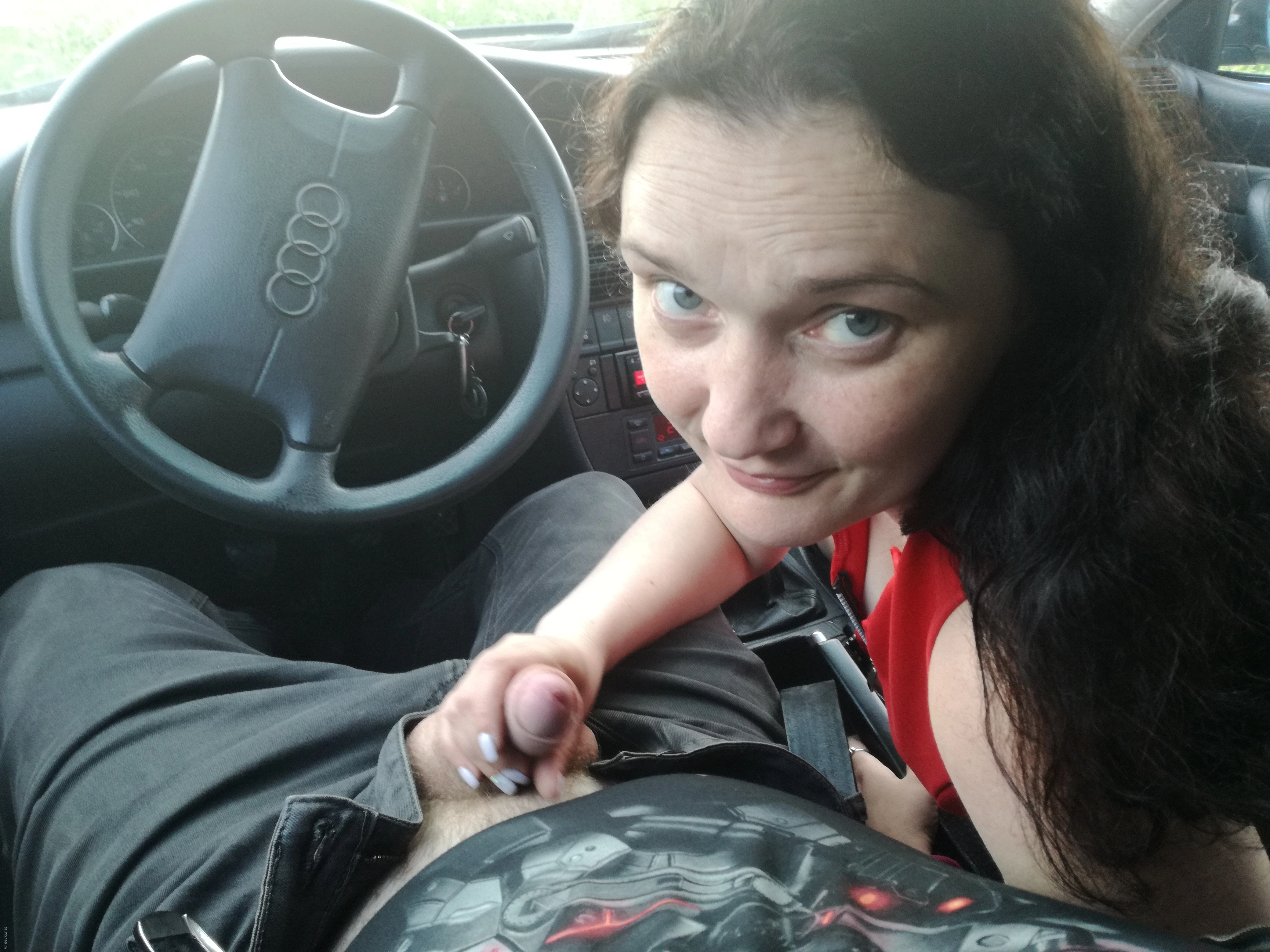 Woman Gives Blowjob in Car: Amateur Porn Photo