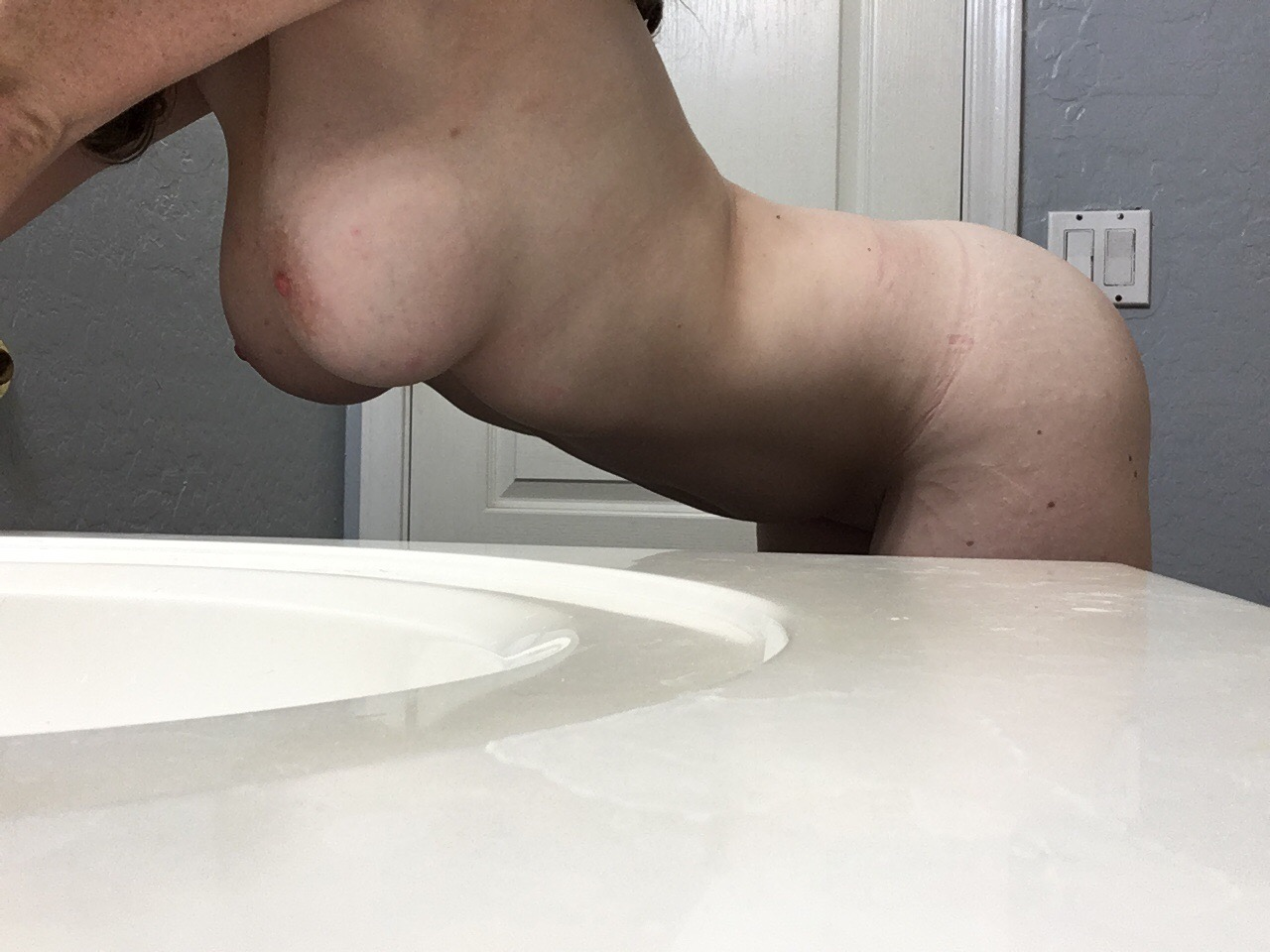 Hot Young Girl with Huge Tits Takes Naked Selfies